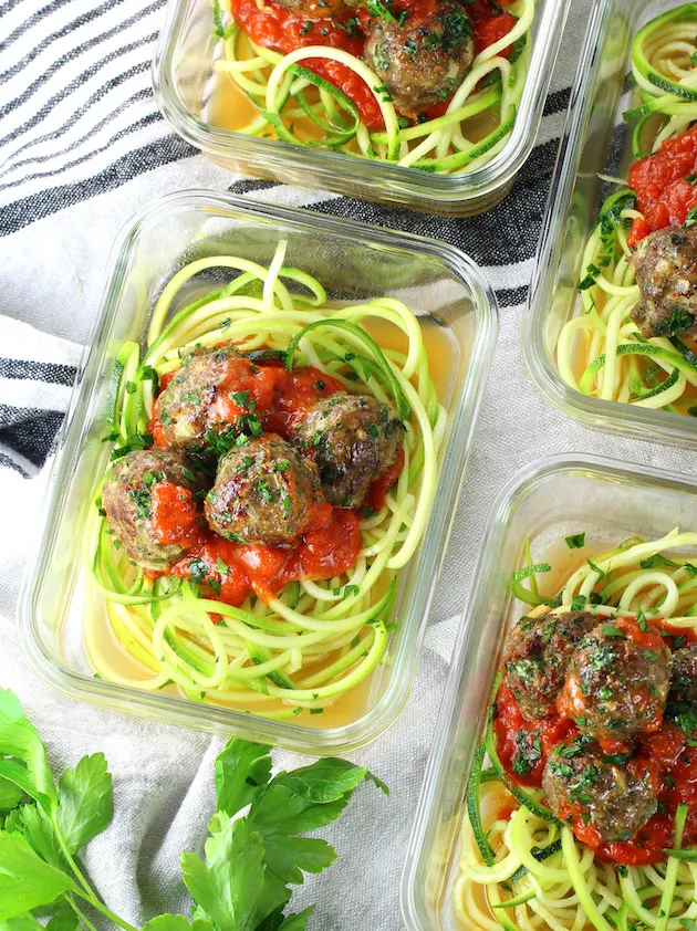 Meal prep containers with turkey meatballs on zucchini noodles
