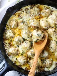 skillet with cheesy french onion chicken meatballs