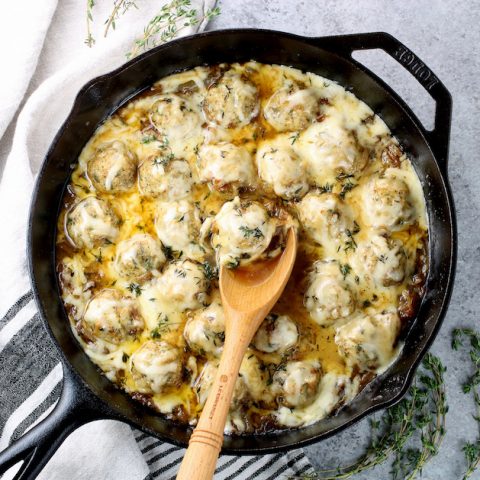 cast iron skillet with french onion chicken meatballs