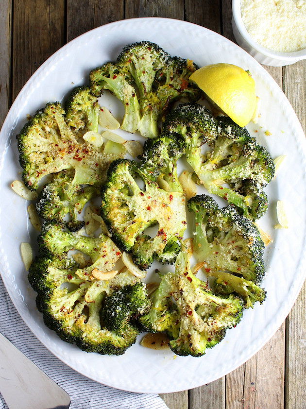 platter of roasted broccoli with parmesan, lemon, and red pepper flakes
