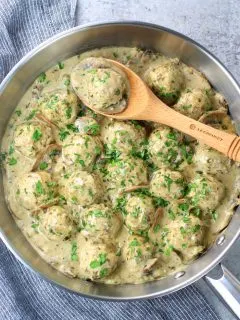 saucepan with low carb turkey meatballs in creamy parmesan sauce