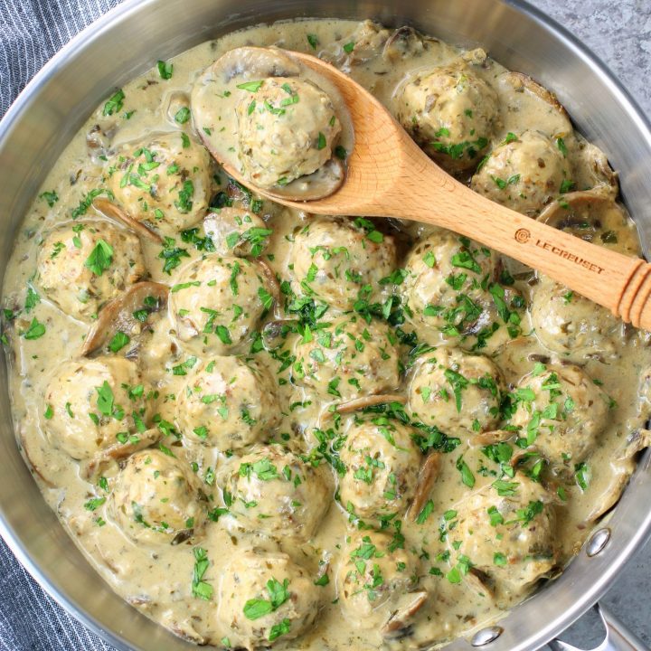 saucepan with low carb turkey meatballs in creamy parmesan sauce